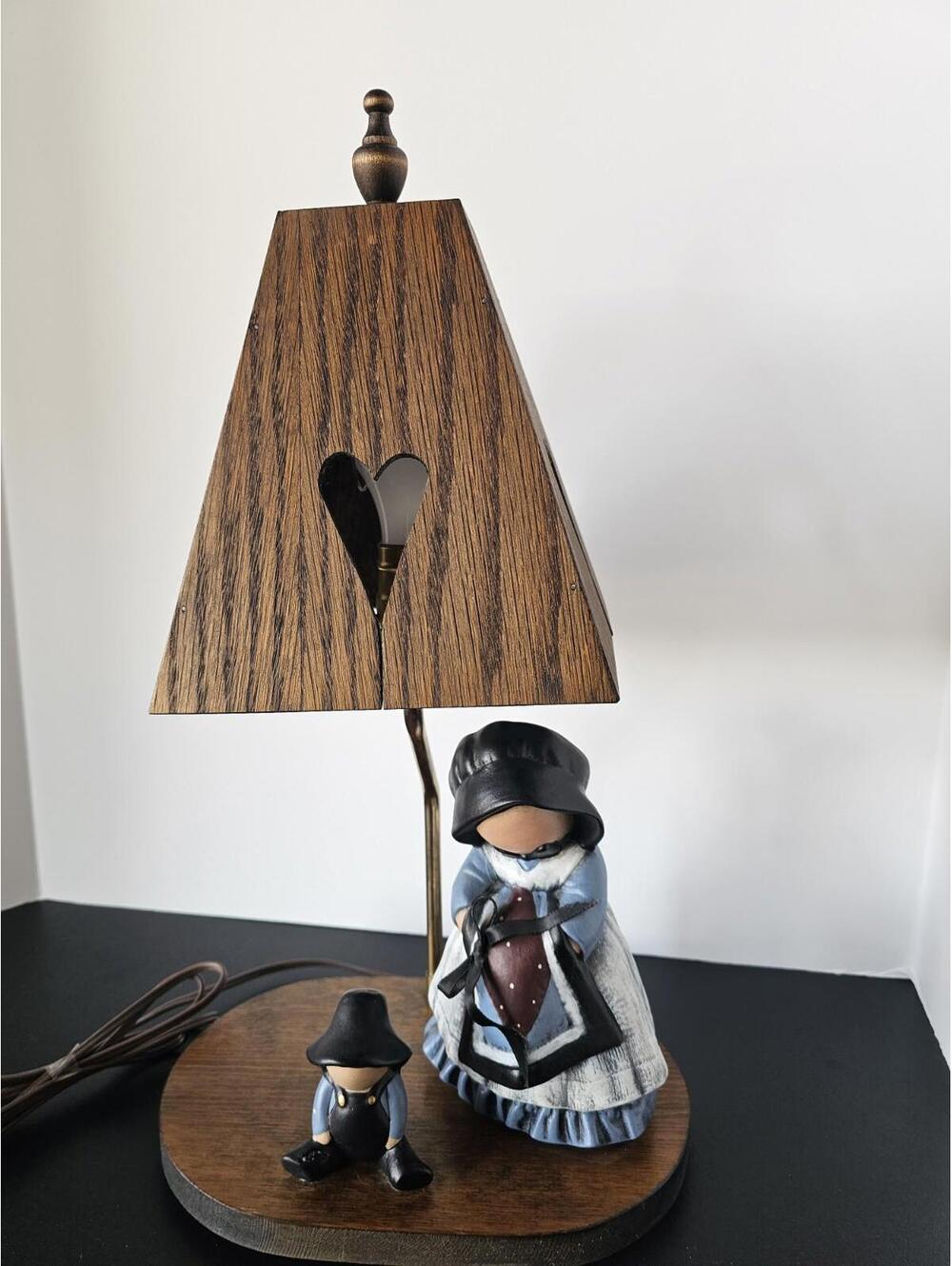 Table lamp features a handcrafted Amish Figurines Wood Heart Lamp Shade